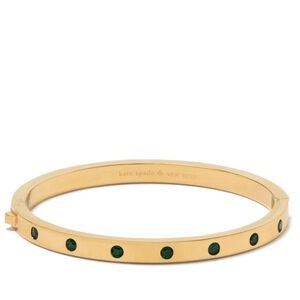 Kate Spade Set in Stone hinged gold bangle with green gems